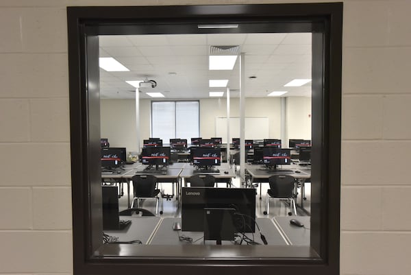  Computer lab can be seen through the window at Paul Duke STEM High School on Thursday, July 19, 2018. 