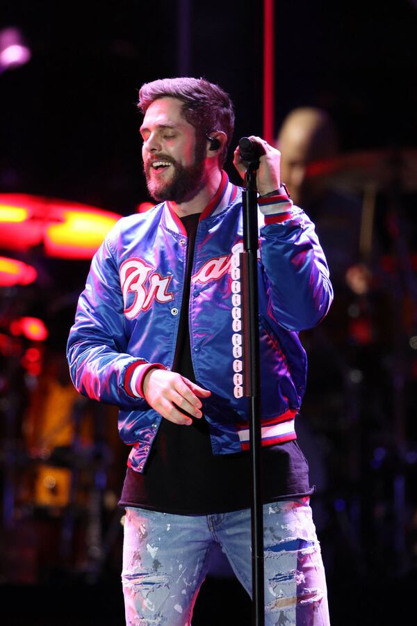 Thomas Rhett gets the crowd warmed up in 2018 at Mercedes-Benz Stadium. The Valdosta native is nominated for two CMA Awards in 2020 and will also perform. Robb Cohen Photography & Video /RobbsPhotos.com