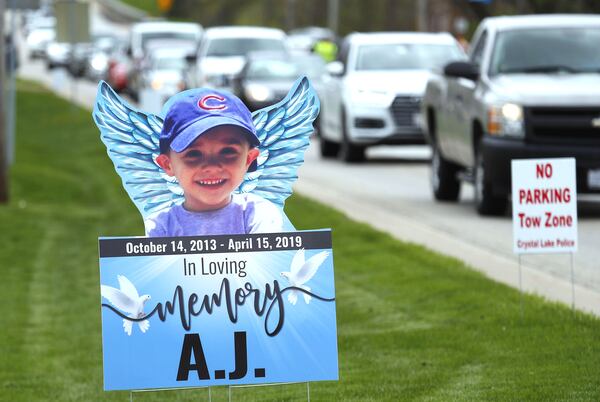 Cars line up May 3, 2019, as mourners head to visitation services for Andrew “AJ” Freund Jr. at Davenport Funeral Home in Crystal Lake, Ill. AJ’S parents, Andrew Freund Sr., 60, and JoAnn Cunningham, 36, face multiple charges, including five counts of first-degree murder, in his April 15 death. The boy, who was reported missing from the family's home April 18, 2019, was found wrapped in plastic and buried in a shallow grave six days later.