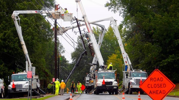 COLUMBUS -- Norris Road at the intersection with Fuller Street was blocked off Thursday as crews from AT&T and Service Electric Company worked to repair a utility poll that was broken in half and caused a power outage in the area.