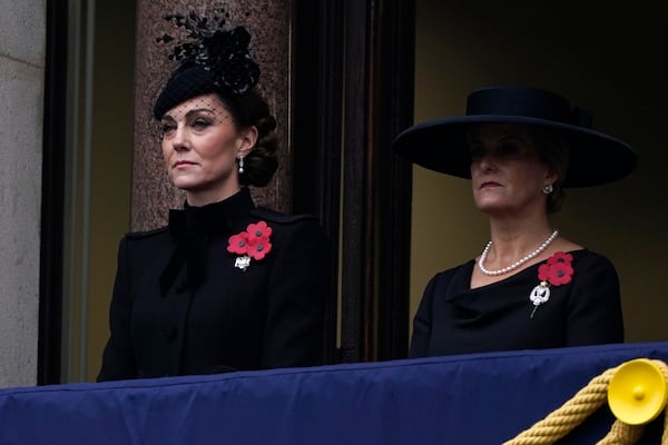 Kate, Princess of Wales, left an Sophie, Duchess of Edinburgh attend the Remembrance Sunday service at the Cenotaph in London, Sunday, Nov. 10, 2024. (AP Photo/Alberto Pezzali, Pool )