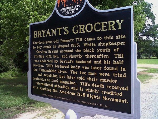 This June 2012 photo shows a historic sign commemorating the lynching of Emmett Till in Money, Mississippi. After the opposite side of the sign, not shown, was vandalized, officials had it repaired. 