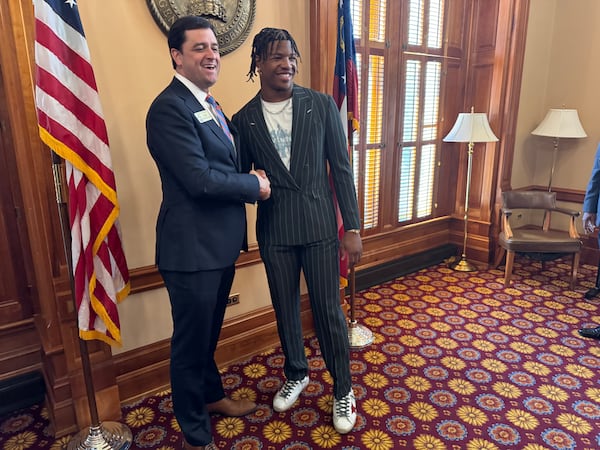 Philadelphia Eagles linebacker Nolan Smith poses for a picture with Georgia state Rep. Scott Hilton, a Republican from Peachtree Corners, on Tuesday at the Capitol in Atlanta.