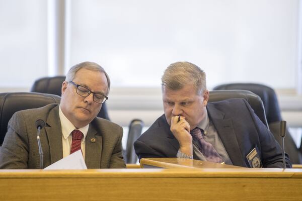 Fayette County manager Steve Rapson, right, listens to members of the county commissioners as the debate access to personal files during a special called open meeting at the Fayette County administrative complex, Wednesday, Jan. 31, 2018. The special meeting was called to question Commissioner Steve Brown’s access to the personnel file of the county 911 director. ALYSSA POINTER / ALYSSA.POINTER@AJC.COM