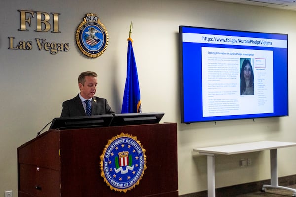 FBI Las Vegas Special Agent in Charge Spencer Evans speaks about a romance scheme that turned deadly during a news conference in Las Vegas, Friday, Feb. 21, 2025. (AP Photo/Ty ONeil)