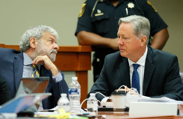 September 26, 2019 - Decatur - Robert "Chip" Olsen (right) confers with attorney Don Samuel as they prepare to strike a jury.  The murder trial of former DeKalb County Police Officer Robert "Chip" Olsen began as attorneys worked to strike a jury this morning.  Opening statements are expected later today.  Olsen is charged with murdering  war veteran Anthony Hill.  Bob Andres / robert.andres@ajc.com