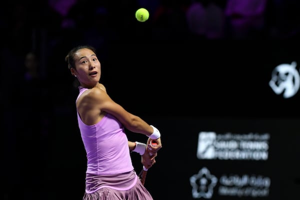 China's Qinwen Zheng plays a shot against Coco Gauff of the U.S. during their women's singles final match of the WTA finals at the King Saud University Indoor Arena, in Riyadh, Saudi Arabia, Saturday, Nov. 9, 2024. (AP Photo)