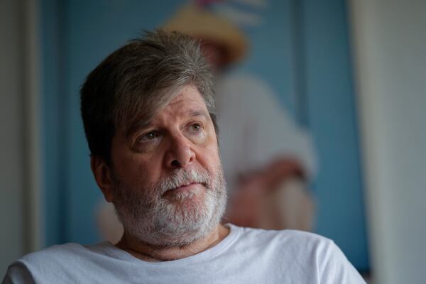 FILE - Brazilian novelist Marcelo Rubens Paiva, the author of the book that served as the basis for the film, "I'm Still Here," poses for a photo during an interview at his home in Sao Paulo, Feb. 18, 2025. (AP Photo/Andre Penner, File)