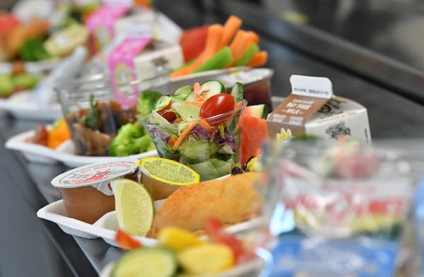 Sample Gwinnett School meals are displayed at Seckinger High School in Buford on Tuesday, Aug. 2, 2022. (Hyosub Shin / Hyosub.Shin@ajc.com)