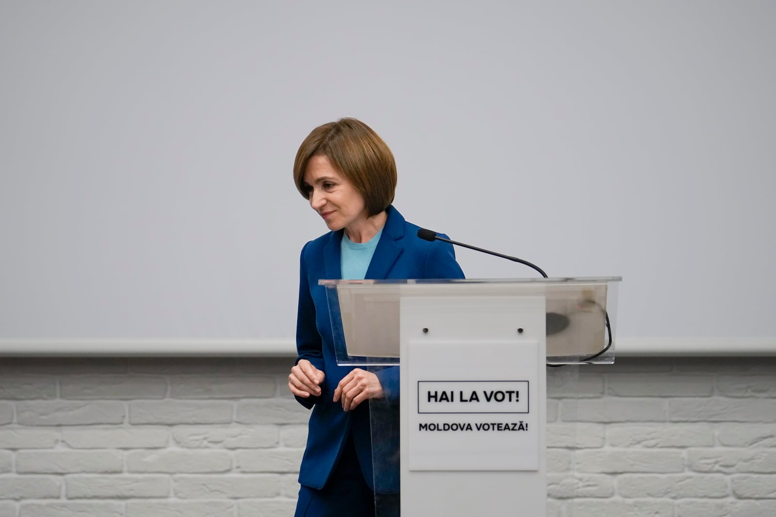 Moldova's President Maia Sandu leaves after speaking to the media during a press briefing after the polls closed for the presidential election runoff, in Chisinau, Moldova, Sunday, Nov. 3, 2024. (AP Photo/Vadim Ghirda)