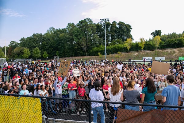 North Atlanta High School students cheer on speakers during a school-wide climate walkout on Thursday, Sept. 26, 2019. REBECCA WRIGHT FOR THE ATLANTA JOURNAL CONSTITUTION