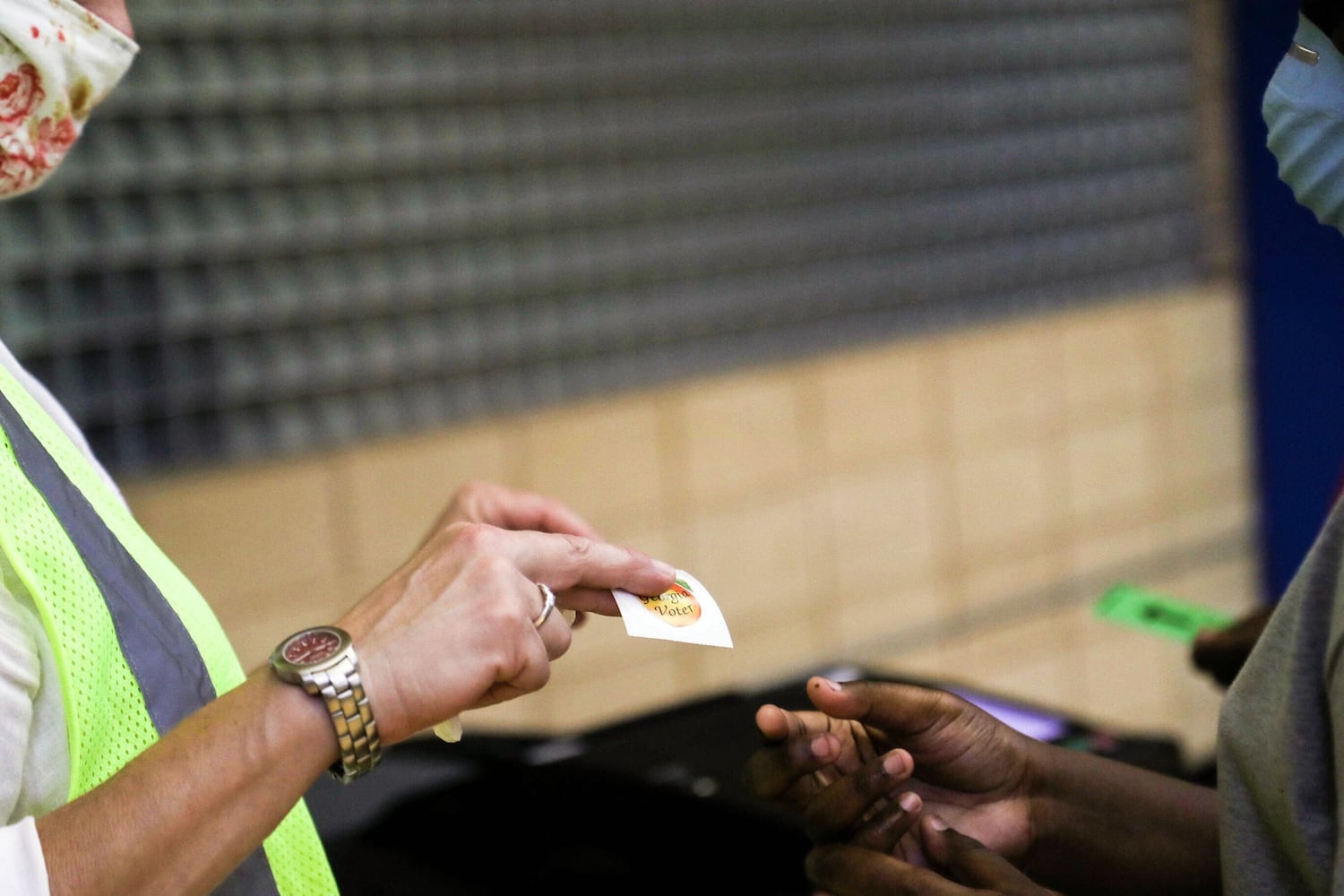 PHOTOS: Georgia voters struggle with long lines, new equipment, social distancing