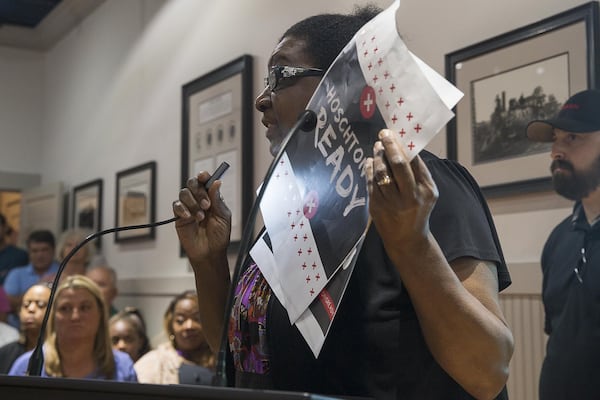 Hoschton resident Mary Morrison speaks during a City Council meeting at the Hoschton Historic Train Depot on Monday, May 6, 2019.