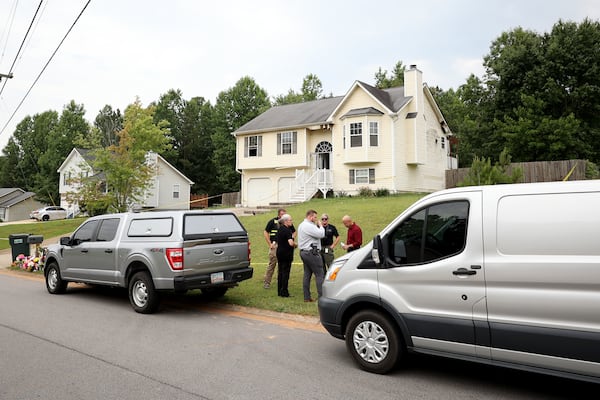 062722 Rockmart, Ga..: Crime scene investigators work the scene at the home on Woodwind Drive where three children died, Friday in Paulding County, Monday, June 27, 2022, in Rockmart, Ga.. The mother of the children, Darlene Brister, 40, is charged with two counts of malice murder following the deaths. (Jason Getz / Jason.Getz@ajc.com)