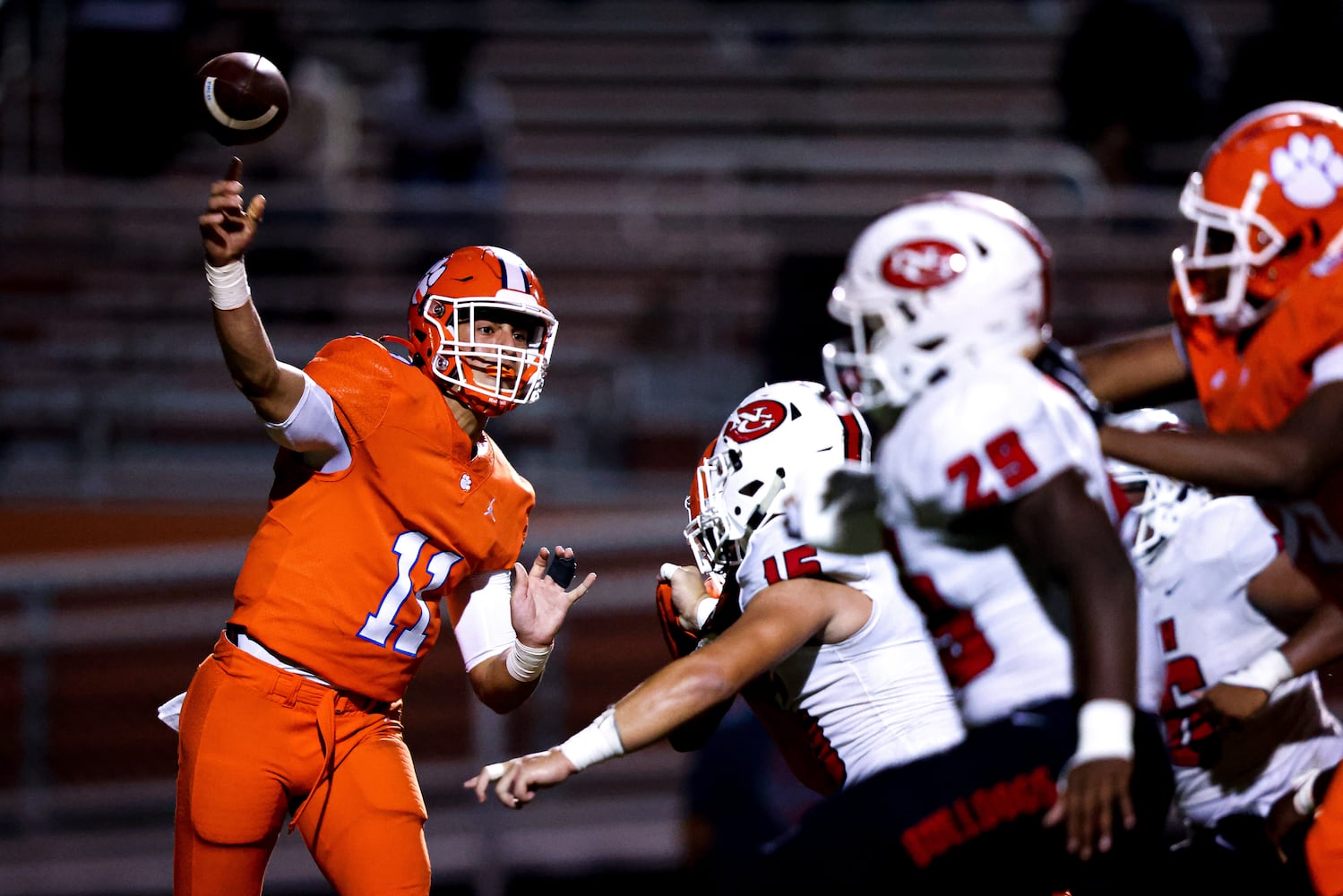 Parkview quarterback Colin Houck (11) passes the ball just before the North Gwinnett defense reaches him during a GHSA 7A high school football game between the North Gwinnett Bulldogs and the Parkview Panthers at Parkview High School in Lilburn, Ga., on Friday, Sept. 3, 2021. (Casey Sykes for The Atlanta Journal-Constitution)