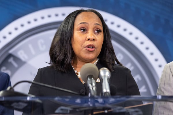 Fulton County District Attorney Fani Willis speaks to the news media following the indictment of former President Donald Trump and 18 others on Monday, August 14, 2023. (Arvin Temkar/arvin.temkar@ajc.com)