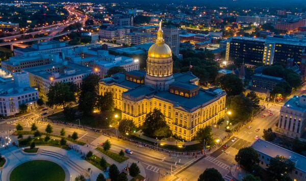 July 29, 2020 Atlanta - Thousands of people wait in line outside to the Georgia State Capitol Wednesday night to view the body of Congressman John Lewis on Wednesday, July 29, 2020. (Hyosub Shin / Hyosub.Shin@ajc.com)