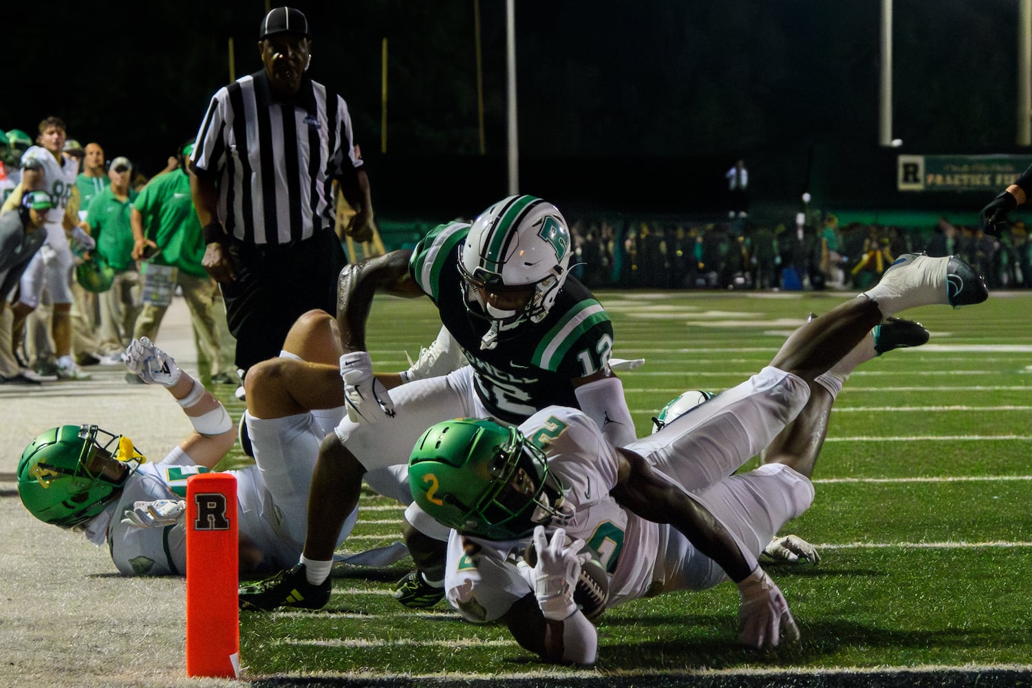 Buford’s Justin Baker makes it into the end zone against Roswell. (Jamie Spaar for the Atlanta Journal Constitution)