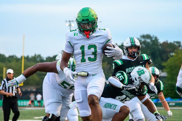 Buford runs the ball in for a touchdown during the Buford at Roswell high school football game in Roswell, Georgia on September 6, 2024. (Jamie Spaar for the Atlanta Journal Constitution)