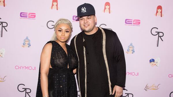 Reality TV star Rob Kardashian in happier times with ex-fiancée Blac Chyna at the Hard Rock Cafe in Hollywood. The couple have a daughter together and are engaged in a public battle of accusations and bad behavior.