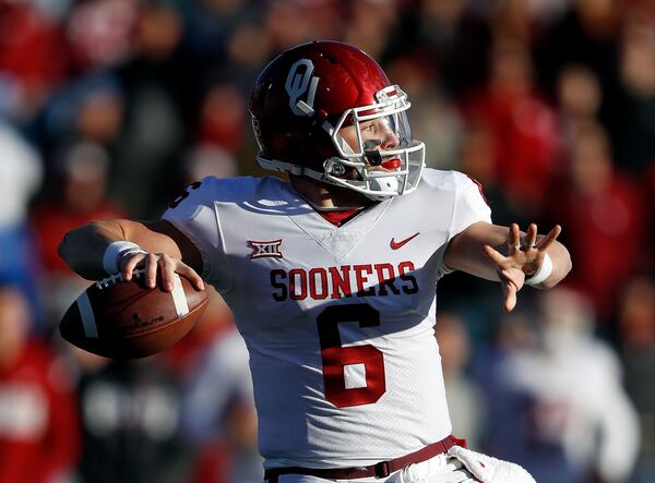 LAWRENCE, KS - NOVEMBER 18:  Quarterback Baker Mayfield #6 of the Oklahoma Sooners passes during the game against the Kansas Jayhawks at Memorial Stadium on November 18, 2017 in Lawrence, Kansas.  (Photo by Jamie Squire/Getty Images)