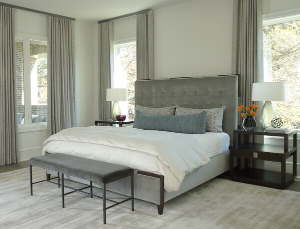 Fresh flowers, sunlight and comfortable bedding are designed to create a soothing bedroom in this Midtown Atlanta project from Tish Mills. Photo: Courtesy of Tish Mills / Chris Little