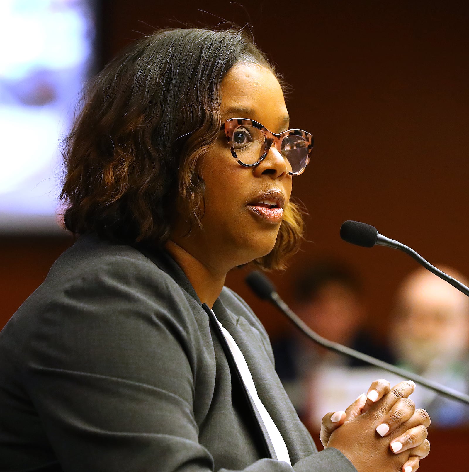 Karli Swift of the DeKalb Board of Elections said Monday that elections would be less secure and expressed concerns over unfunded mandates as she addresses Georgia senators hearing from the public and county election directors about their concerns with a sweeping voting bill that increases police powers and ballot inspections. Curtis Compton / Curtis.Compton@ajc.com