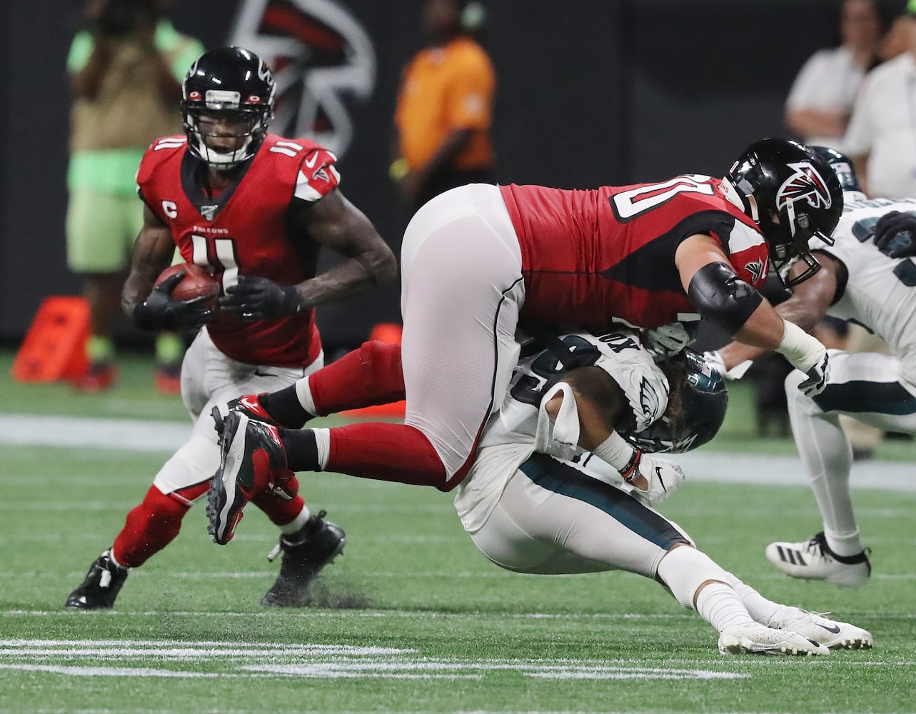 Photos: Falcons outlast Eagles for first win