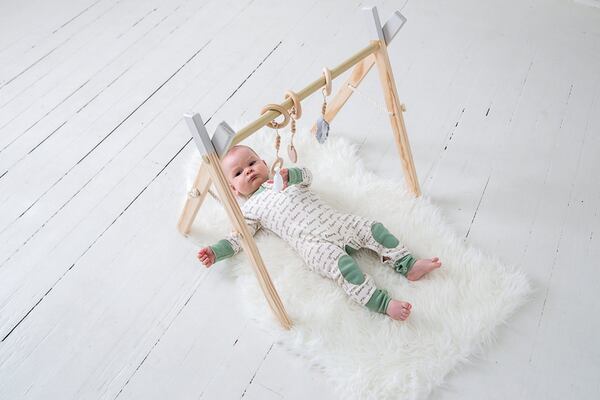 Marietta-based Clover and Birch creates modern wooden toys, including its best-selling activity gym for babies. Contributed by cloverandbirch.com