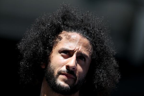 NEW YORK, NEW YORK - AUGUST 29: Former San Francisco 49er Colin Kaepernick watches a Women's Singles second round match between Naomi Osaka of Japan and Magda Linette of Poland on day four of the 2019 US Open at the USTA Billie Jean King National Tennis Center on August 29, 2019 in Queens borough of New York City. (Photo by Al Bello/Getty Images)