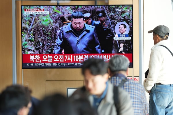 A TV screen shows an image of North Korean leader Kim Jong Un during a news program at the Seoul Railway Station in Seoul, South Korea, Thursday, Oct. 31, 2024. The letters read "North Korea, launched a new intercontinental ballistic missile today." (AP Photo/Lee Jin-man)