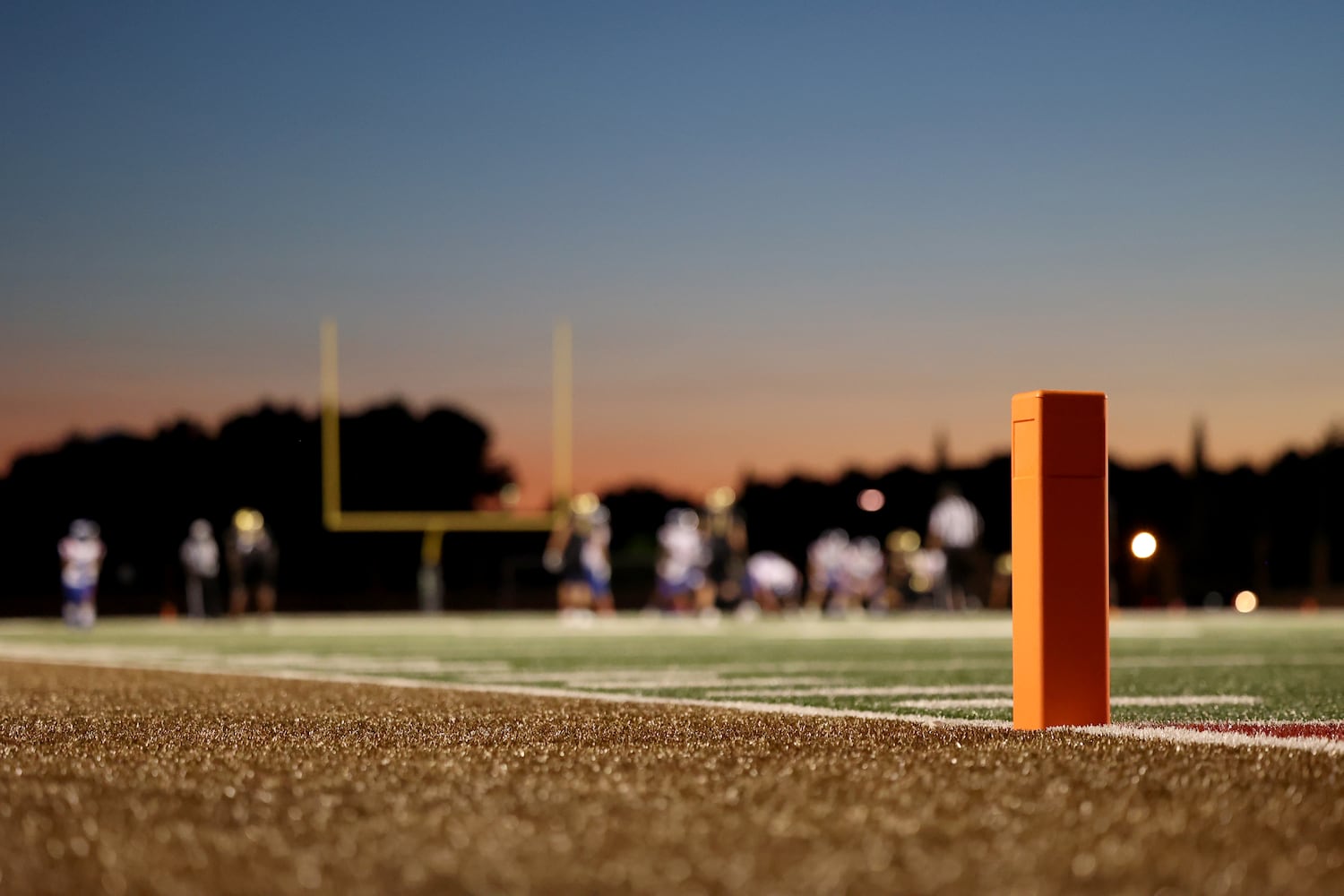 Sept. 24, 2021 - Johns Creek, Ga: An end zone pylon is shown as the sun sets at Johns Creek high school during their game against Riverwood Friday, September 24, 2021 in Johns Creek, Ga.. JASON GETZ FOR THE ATLANTA JOURNAL-CONSTITUTION