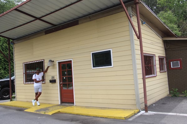 Bryan Furman stands outside the new home of Bryan Furman BBQ at 186 Windy Hill Rd., the former home of Herb's Rib Shack in Marietta.