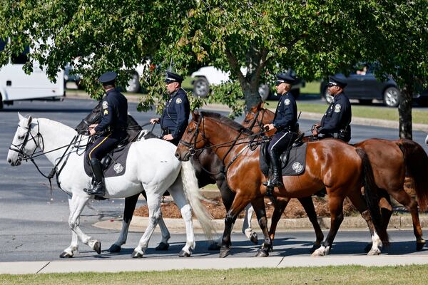 Mounted Atlanta Police officers arrive for the funeral of Deputy Marshall Ervin Jr. at West Ridge Church, Thursday, September 15, 2022, in Dallas. Cobb County Sheriff Deputy Ervin, alongside Jonathan Koleski was killed late Thursday while attempting to arrest Christopher James Cook Jr. at home in the Hampton Glen subdivision last Thursday. (Jason Getz / Jason.Getz@ajc.com)