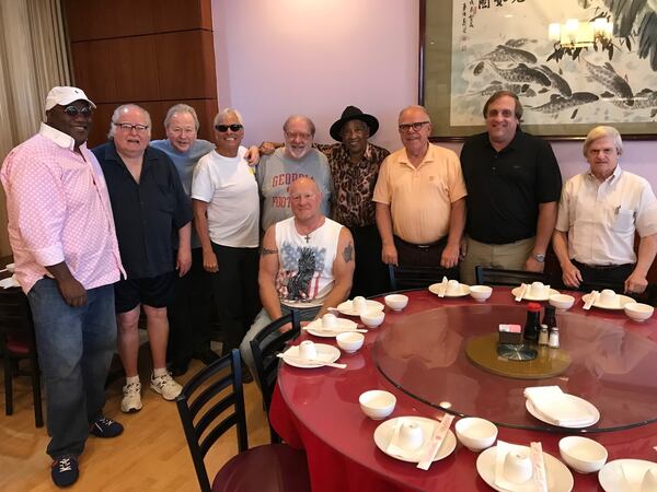 The May 2019 meeting of the ATL Music Lunch Club included old-school Georgia soul music artist Hermon Hitson (center). Posing for the traditional post-lunch shot were (back, from left): Joey Sommerville, Dick Wooley, Mark Pucci, Forrest Haller, Bill King, Hitson, Randy Roman, Glenn Halverson and Vince Canipelli. In front is John McKnight. (Courtesy of Mark Pucci)