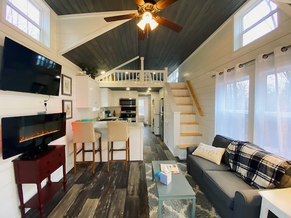 Get a taste of tiny house living at Cricket by the Creek, part of a mountaintop tiny home community in northwest Georgia. Courtesy of Airbnb