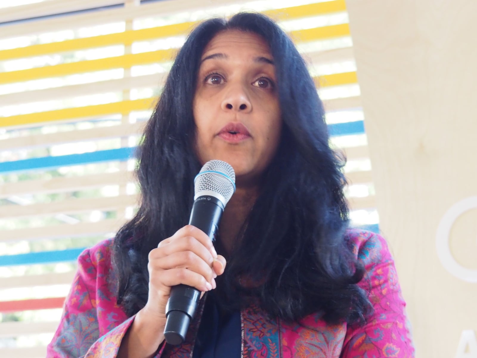 Google Atlanta co-site leader Hatel Joshi Gordon announces Google’s $1 million commitment to Georgia nonprofits at the company’s Midtown office groundbreaking on Monday. (Credit: Raisa Habersham/raisa.hbaersham@ajc.com)