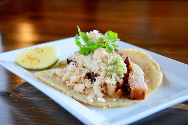 A pork belly taco from CT Cocina & Taqueria gets salty crunch from chicharrones. CONTRIBUTED BY JORGE FLORES