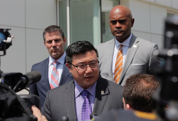 U.S. Attorney Byung J. "BJay" Pak, along with Chris Hacker, FBI Special Agent in charge and  Thomas Holloman III, IRS investigator, talk to media after Wednesday's hearing.  Bob Andres / bandres@ajc.com