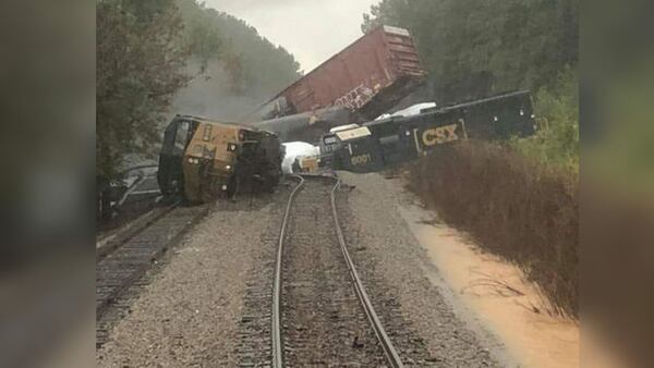 A CSX train possibly carrying hazardous materials derailed Sunday likely because of heavy rain and flooding, officials said. (Photo: WSOCTV.com)