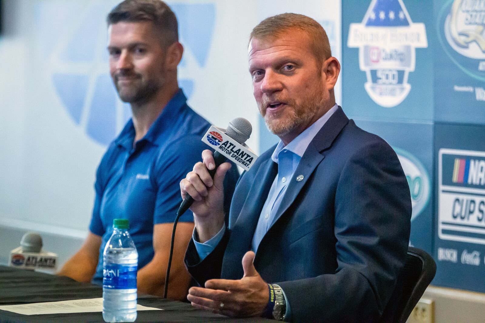 Brandon Hutchison (right) sits next to Steve Swift during a press conference at Atlanta Motor Speedway in  Hampton Tuesday, July 6, 2021.  STEVE SCHAEFER FOR THE ATLANTA JOURNAL-CONSTITUTION