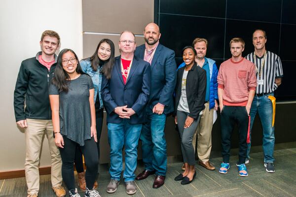 The winning team from Georgia Tech's first-ever "Sports Innovation Challenge," held two weekends ago on campus. In a 24-hour span, the five-student team created software to help organize and present electronic data collected by the Tech volleyball team on players' jumping in practice and games through a wearable device. The challenge, student Nancy Tao said, was to “figure a way to interpret the data and then visually show the athletic trainers and staff a better way. The way their interface works currently, or it looks, is not easily accessible to the athletic trainers unfortunately, so they had to create an easier way for them to understand.” In this photo, from left to right: Cole Bowers, Tao, Do Hee Park, Matt Pugmire (judge and senior manager at Atlanta Liquid Studio), Karl Pierburg (judge and vice president of technology, data and analytics for AMB Sports and Entertainment), Maiya Newton, Daniel Budd and Doug Allvine (Georgia Tech assistant athletic director for innovation). Tech basketball coach Josh Pastner was also a judge. Allvine said that the team had a slick presentation and answered the challenge as it was posed to them. “The judges asked them some pretty hard questions and they had really good answers as far as how they were going to utilize this to help the team,” he said. (Georgia Tech)