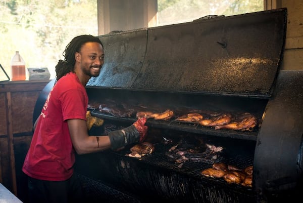 Bryan Furman in the smokehouse at B’s Cracklin’ Barbecue in Riverside. CONTRIBUTED BY MIA YAKEL