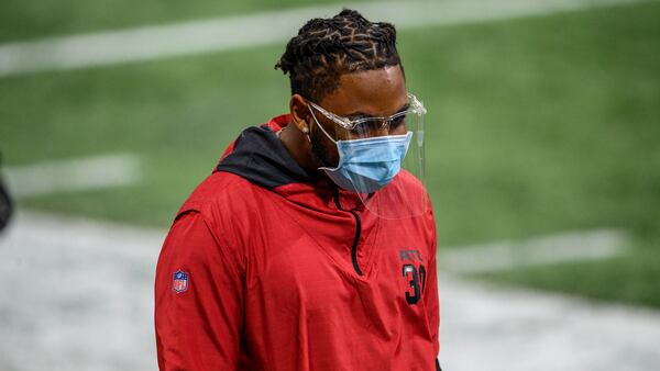 Atlanta Falcons running back Qadree Ollison (30) walks the sideline during the second half against the Tampa Bay Buccaneers, Sunday, Dec. 20, 2020, in Atlanta. (Danny Karnik/AP)