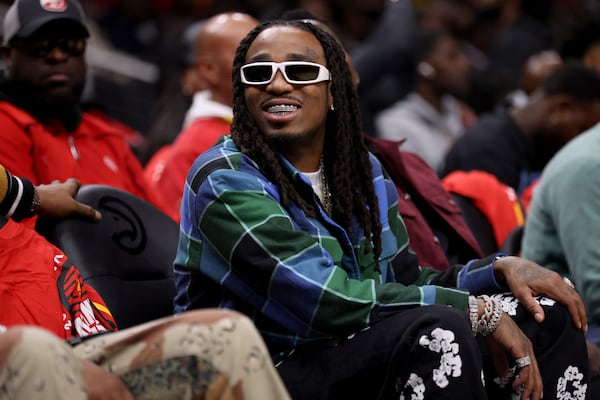 Rapper Quavo takes in the Atlanta Hawks game against the Houston Rockets at State Farm Arena, Wednesday, October 19, 2022, in Atlanta. (Jason Getz / Jason.Getz@ajc.com)