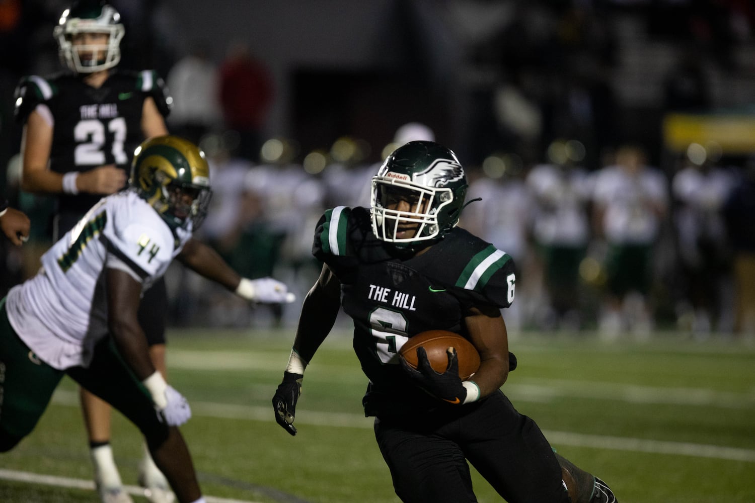 Collins Hill's Spenser Anderson (6) carries the ball during a GHSA high school football game between the Collins Hill Eagles and the Grayson Rams at Collins Hill High in Suwanee, GA., on Friday, December 3, 2021. (Photo/ Jenn Finch)