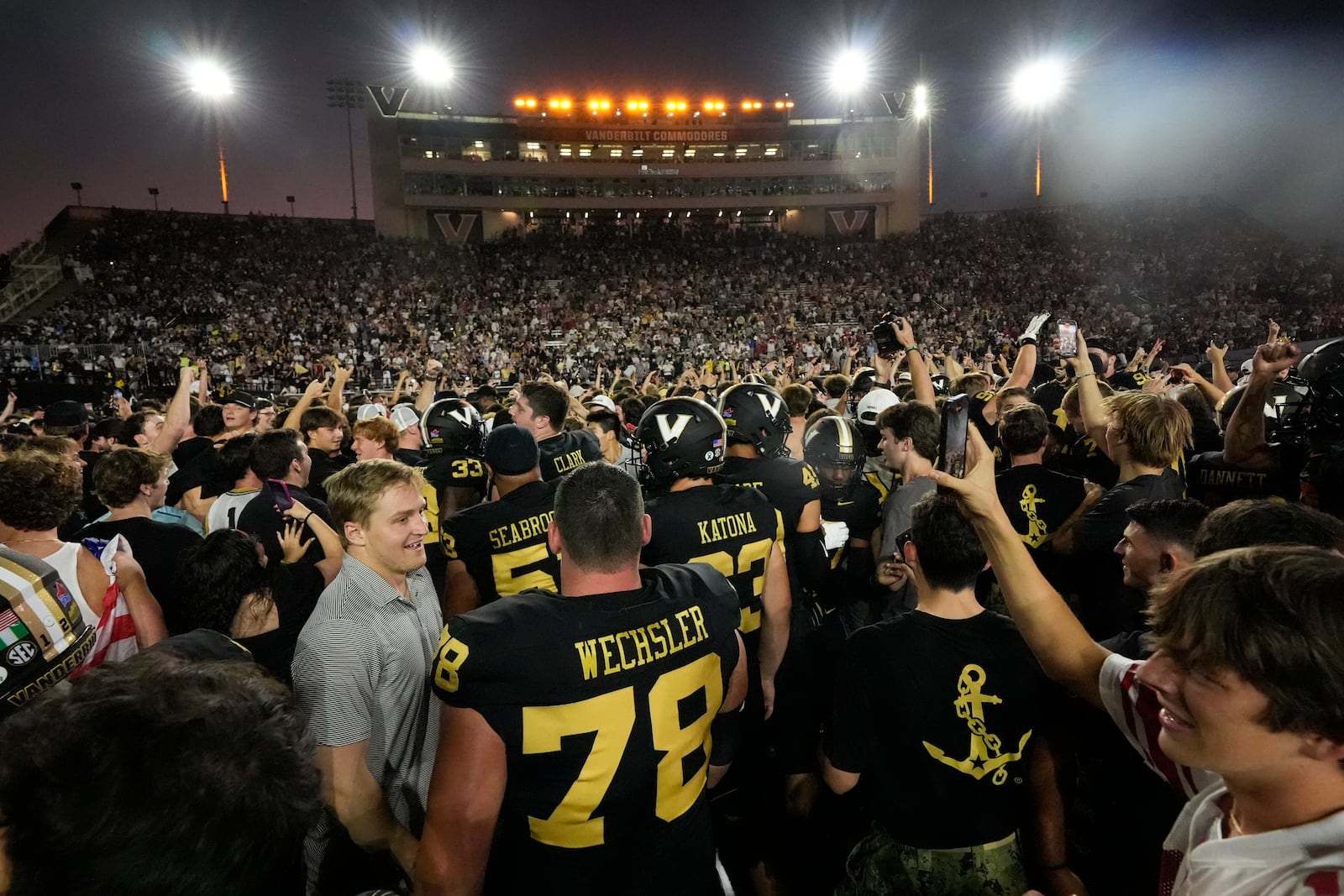 Vanderbilt celebrates the team's 40-35 win against Alabama on the field after an NCAA college football game Saturday, Oct. 5, 2024, in Nashville, Tenn. (AP Photo/George Walker IV)