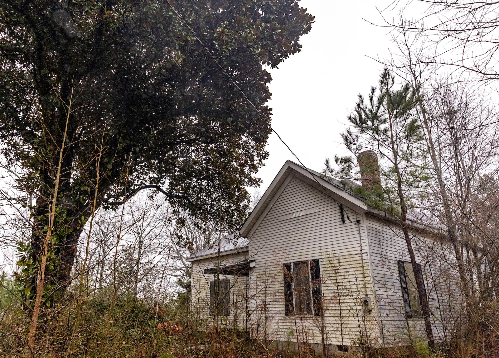 A University of Georgia study recently outlined the history and need for preservation of a tract of land in eastern Gwinnett that runs near GA 316.  The area of about 2,000 acres includes a farmhouse from 1894, a water well, one of the oldest dirt road in the state and several homesteads where only a chimney or dandelions remain as a marker on Thursday, Feb 3, 2022.  The Rowen Study suggests environmentally conscious development with trails and historical highlights.  (Jenni Girtman for The Atlanta Journal Constitution)