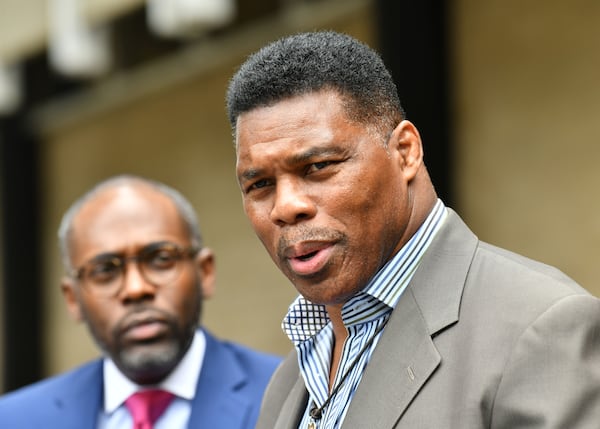 Republican Herschel Walker has said he won't participate in an Oct. 13 debate at Mercer University with Democratic U.S. Sen. Raphael Warnock and Libertarian candidate Chase Oliver because it conflicts with Sunday night football — even though the debate is on a Thursday. (Hyosub Shin / Hyosub.Shin@ajc.com)