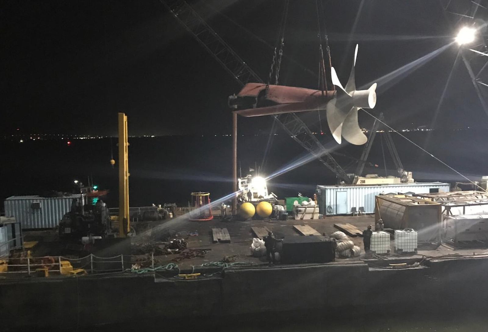 Crews transfer the propeller from the M/V Golden Ray to the work barges for safe removal, St. Simons Sound, Dec. 20, 2019.